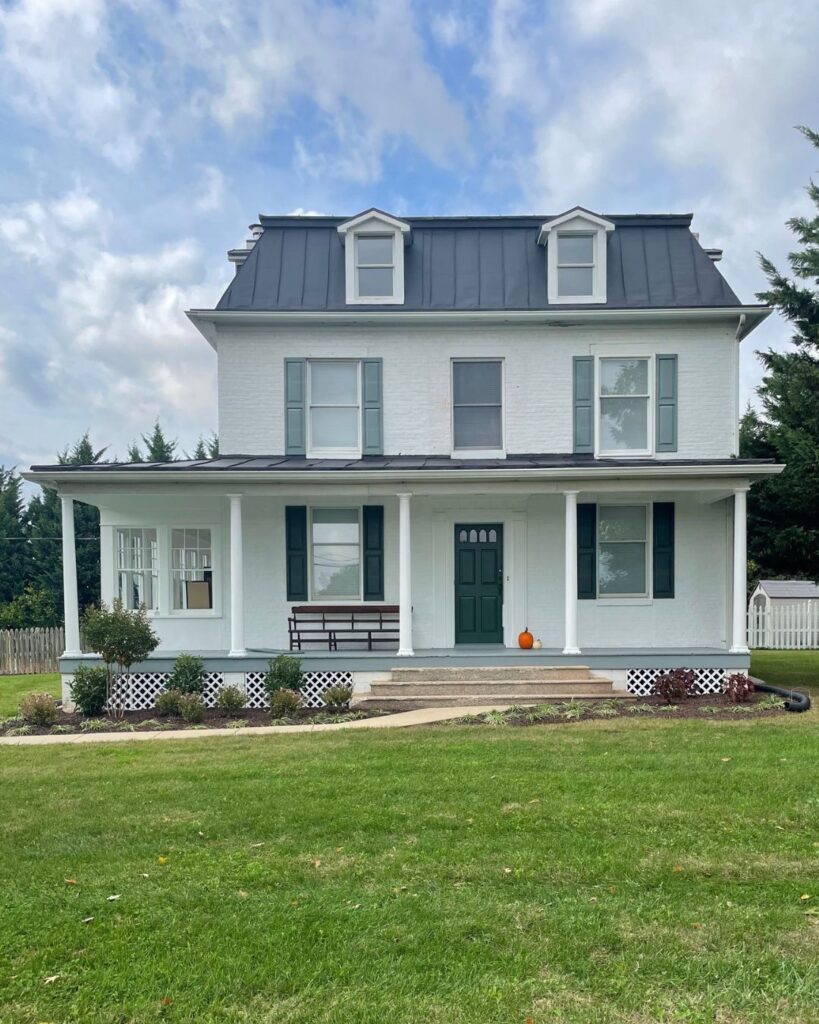 photo of a farmhouse and yard