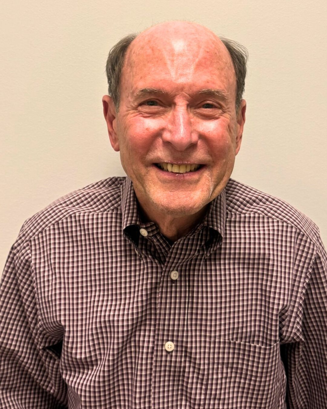 color headshot photo of board president Benny Bienvenue