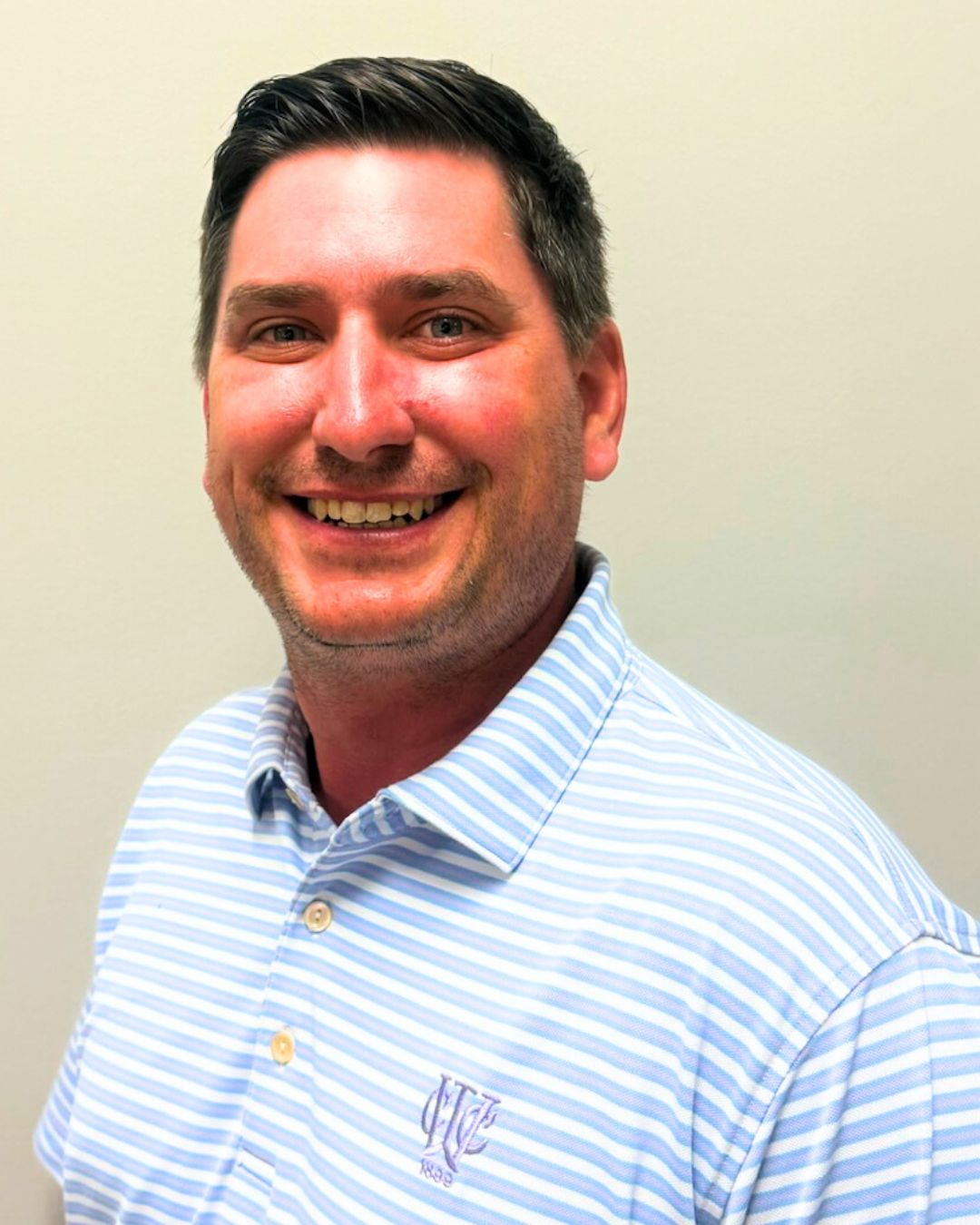 color headshot photo of board member and treasurer Tim Stolz